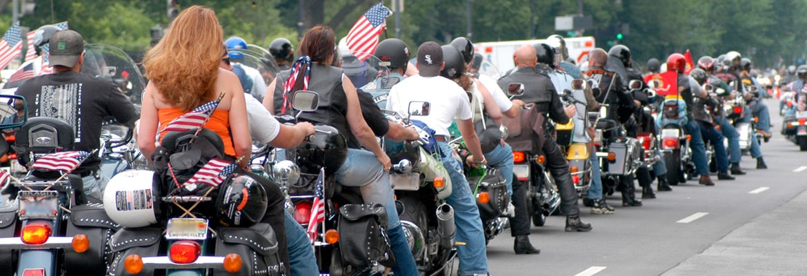 Line of people on motorcycles at rally