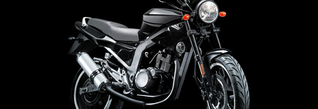 Image of a black motorcycle on a black background