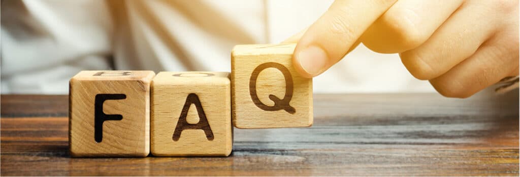 Image of wooden blocks spelling FAQ