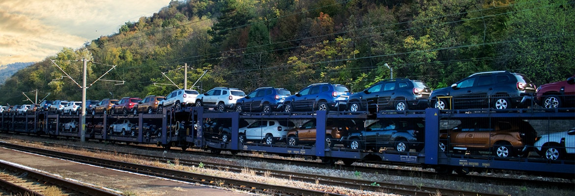 Trailers of cars being shipped by a train