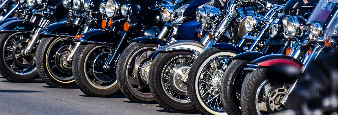 Row of motorcycles perhaps at a rally