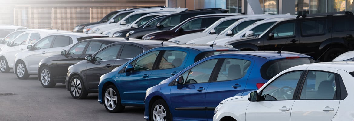 Rows of certified pre owned and used cars.