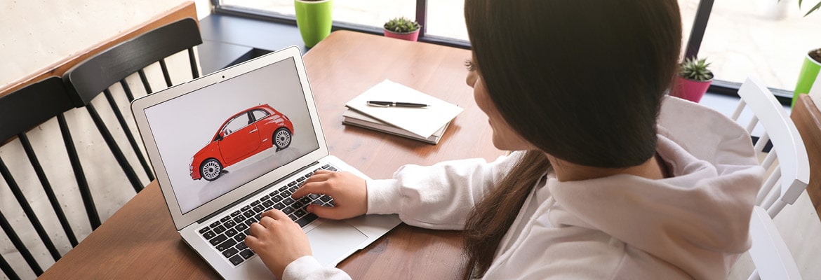 Hurricane Ian victim looks at red car at online dealership.