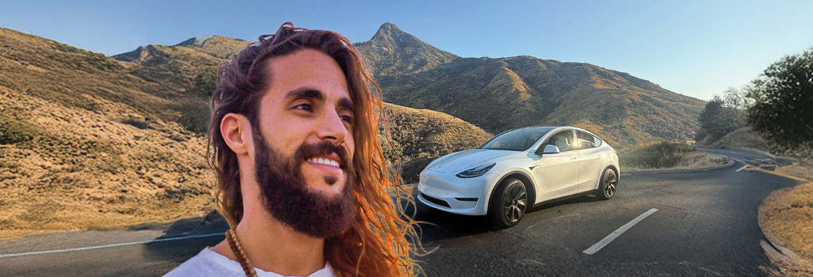 white tesla traveling crosscountry