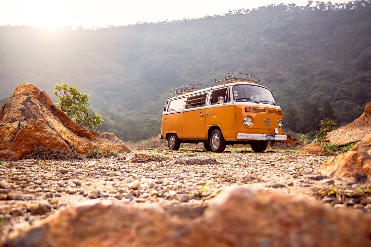 Orange Volkswagen van being shipped from California to Hawaii.