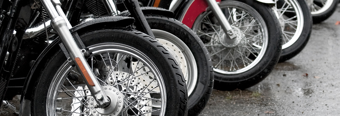 Row of motorcycles ready for transport.