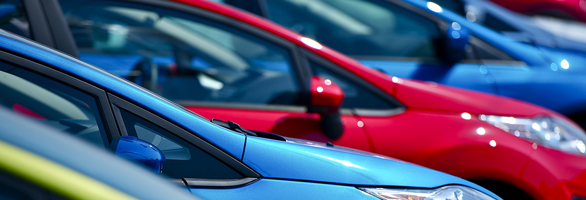 Cars at a dealership.