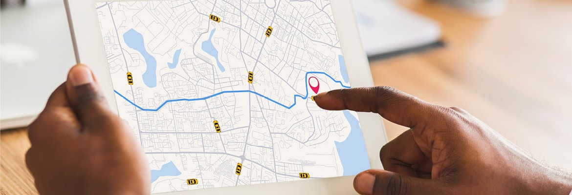 Map on tablet of auto transport tracking and delivery routes.
