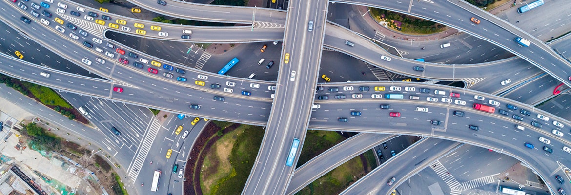 Aerial view of a complex highway interchange.